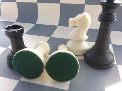 Chess pieces should have a felted base to prevent scratch marks.